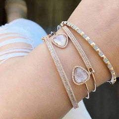 Diamond bar bangle stacked with other bangles