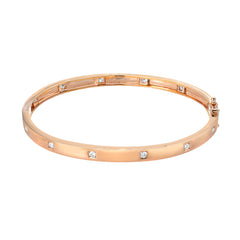 14k rose gold high polish bangle with diamonds