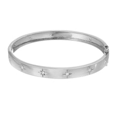 Starburst high polish bangle in white gold