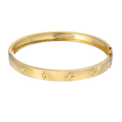 Starburst high polish bangle ine yellow gold