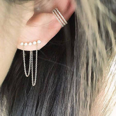 Triple row ear cuff shown on ear