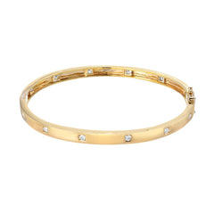 14k yellow gold high polish bangle with diamonds