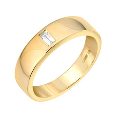 high polish 14k gold cigar band with baguette diamond