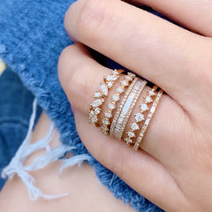 baguette and diamond halfway band stacked with other liven rings