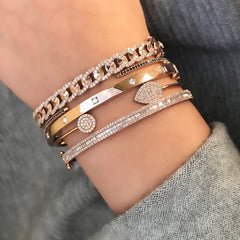 edgy rose gold bangle stack