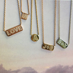 plaque necklaces