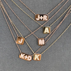 petite initial tag necklace with diamonds