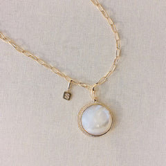 layer this charm on our hand made chain with other charms from our collection