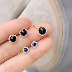 blue corundum rosies in a variety of sizes and styles