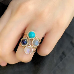 a selection of rosie rings in various colored stones