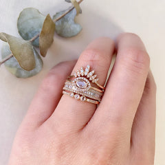 marquise arch band stacked with other liven rings