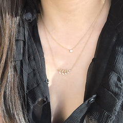 leaf necklace in 14k gold with diamonds