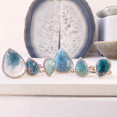 a stunning array of paraiba tourmaline rings