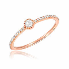 single rose cut diamond on halfway band in rose gold