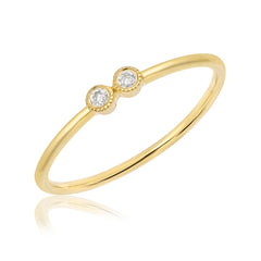 14k gold hand pulled wire band with double bezel set petite diamond