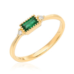 Emerald baguette center band with highlight diamonds