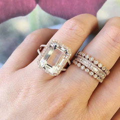 Emerald cut white topaz ring on hand