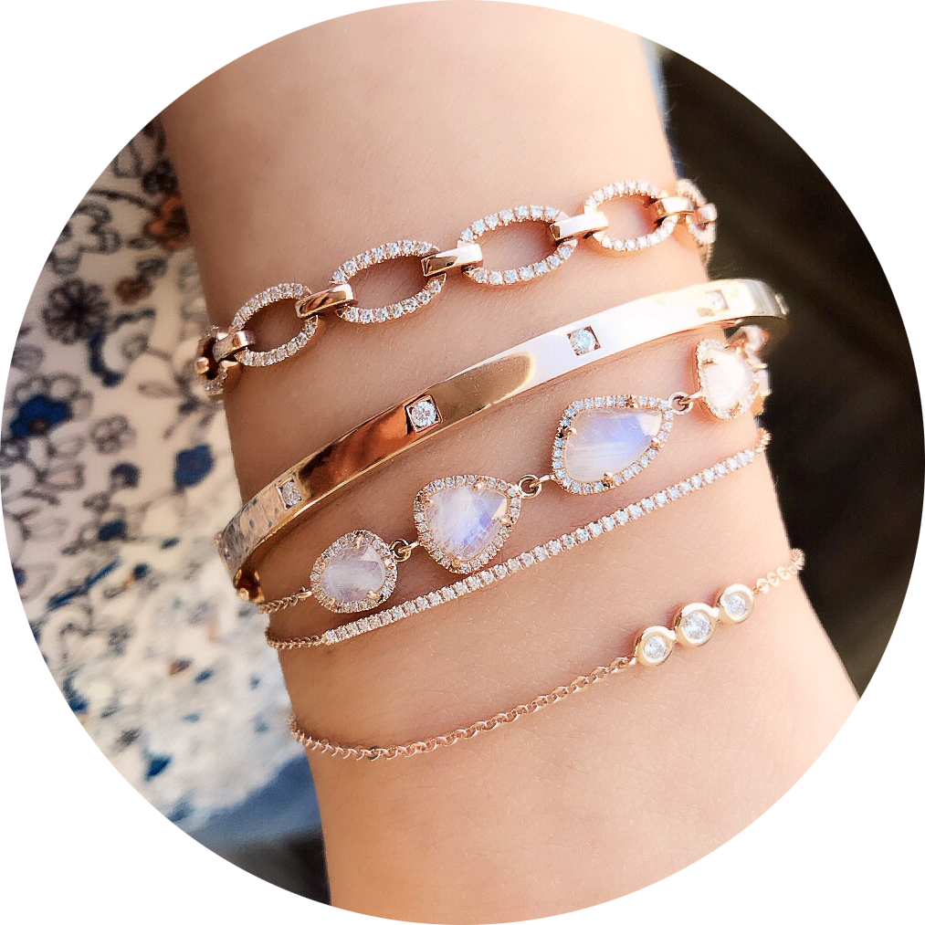 a selection of pretty 14k rose gold liven bracelets